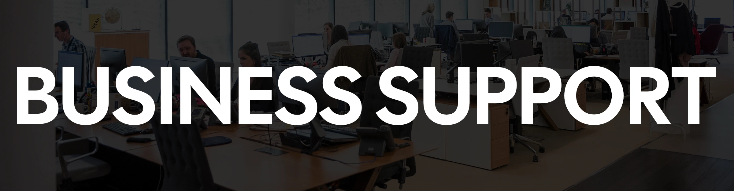 banner showing business support text overtop of an office